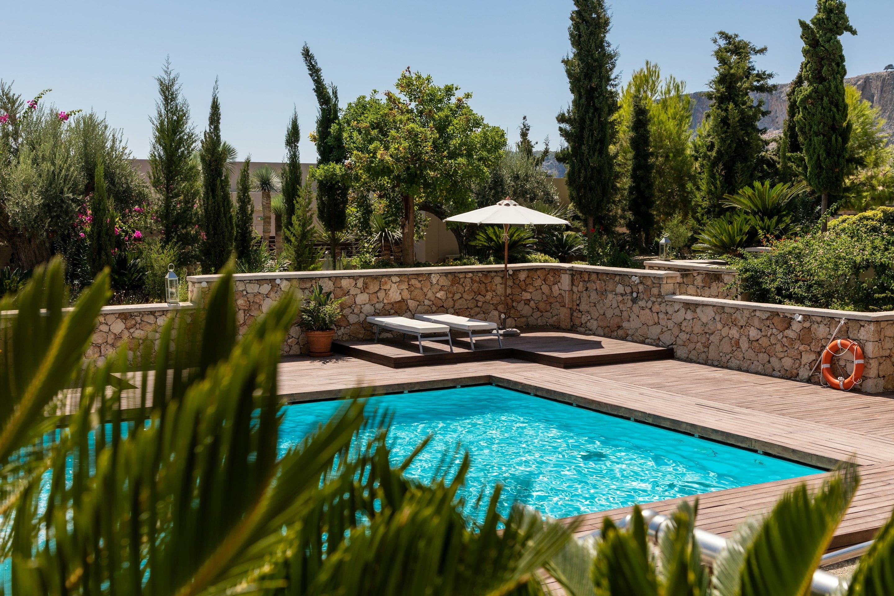 Residential swimming pool in a backyard